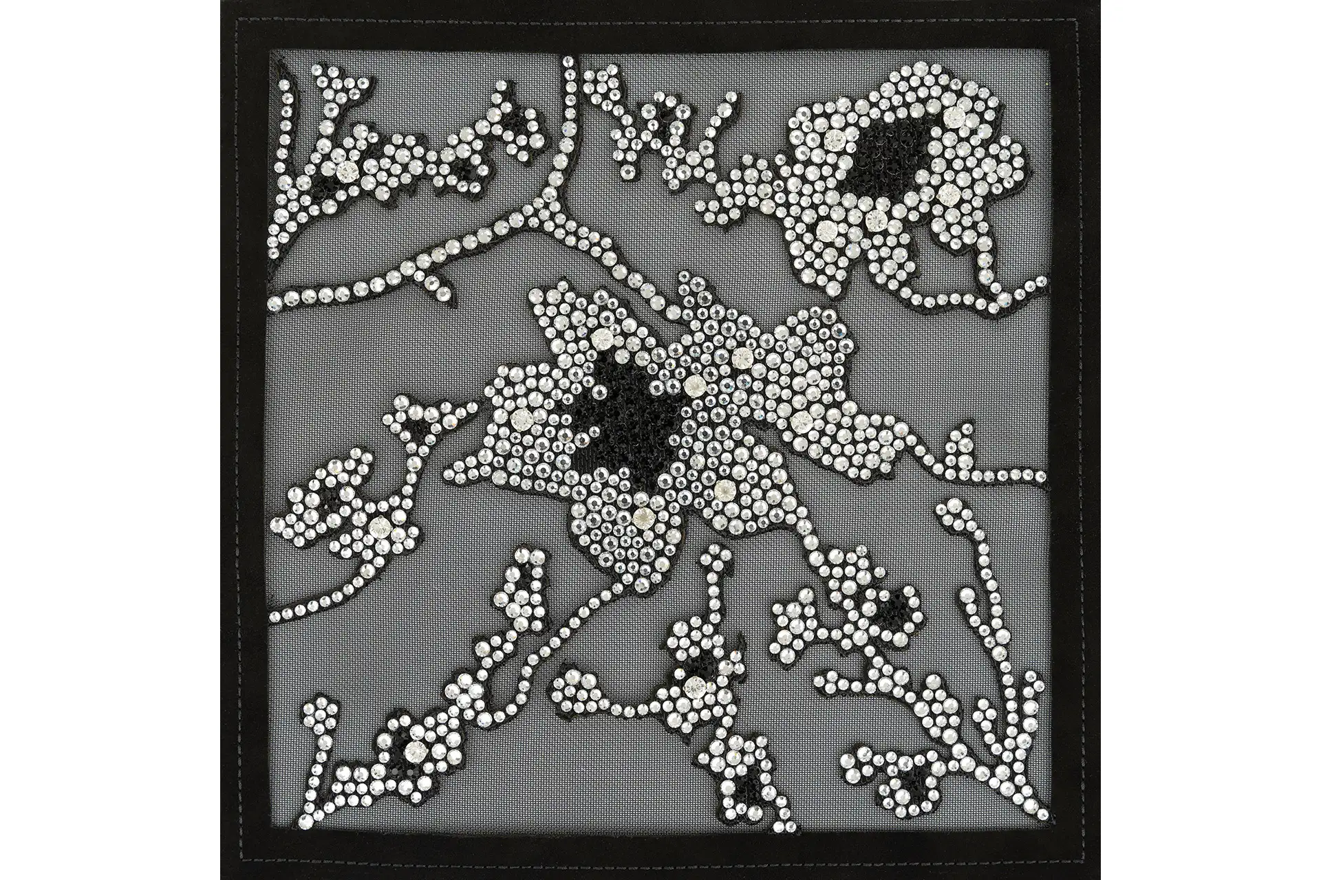 Laser processing and rhinestone application